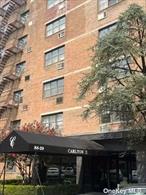 This description presents a spacious and well appointed top floor 2 bedroom, 2 bath unit in the desirable Carlton Bldg. Here is a breakdown of the key features: Entryway: includes an extra lg. walk in closet & an additional coat closet providing ample storage space. Living Rm/Dining Rm: Airy space with 8&rsquo; double hung windows overlooking open tree top views. Kitchen; Galley style kitchen with ceiling height cabinetry on both sides with plenty of countertop space. Bathrooms: Both bathrooms are updated featuring white & black glazed subway tiles. Master bedroom has shower stall Master Bedroom: King sized with Walk in Closet Second Bedroom: includes a double sized closet Base Maint: 1066, RE Tx ( 123), Dishwasher 9, window assess 128, refrig 15, security 17, assess 55, assess 135,  a/c 45. The window assessment is on going and will be fulfilled by April 2027. This description highlights the units spaciousness, ample storage, stylish updates & beautiful walnut colored hardwood floors through out and FRESHLY PAINTED ROOMS making it an appealing option for potential buyers. The building has a children&rsquo;s playground, bike room, on site super and is storage available