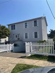 This colonial home boasts an open floorplan with 3 Bedrooms and 3 Bathrooms. The house offers a 10-minute stroll into the town and a 28-minute train ride to Grand Central in New York City. Schools, shops, restaurants, and bars are all very close by. There is easy access to major highways in minutes. The main floor has a kitchen with a gas stove, a new fridge, and a dishwasher. The bright dining room next to the kitchen has access to the back deck. The second floor has a large master bedroom with a spacious walk-in closet and bathroom. The second bedroom was originally a two-bedroom that was converted. The bedroom is very spacious: it has two closets and could easily be converted into two bedrooms. The third bedroom is smaller but has a big closet and there is a full bathroom of the hallway. The large driveway has a two-car garage attached. The capacious unfinished basement has lots of storage space. The brand-new deck and patio lead into the beautiful backyard.