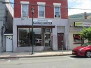 **AAA** Retail location on NEW MAIN STREET of Village of Haverstraw. **Central Business District** Across form Municipal parking lot / Bank / Village Hall. Large store almost 2, 000 sq. ft. with back lot to provide access from rear for deliveries and storage or private parking. Also can be used for outdoor sitting area. Great for most retail business. Existing slat board walls for display use. Nothing to do for retail store. Or customize for any other business. Join in the revival of this waterfront Village. Hurry before someone else gets this opportunity.