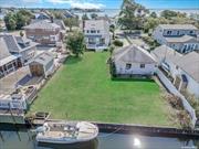 Embrace the potential of this waterfront gem with stunning water views and direct water access! This delightful waterfront property boasts 4 large bedrooms, 2 full bathrooms, a spacious sunlit eat-in kitchen, a formal living room and dining room perfect for gatherings. Enjoy the warmth and charm of the two fireplaces and take advantage of the versatile office space that can easily serve as a 5th bedroom. With generously sized rooms and a picturesque setting, this home is ready for you to update and make your own!