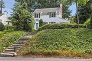 Welcome to this charming 3 bed, 1.5 bath Colonial in coveted Green Knolls. This bright and sunny home offers a perfect blend of classic architectural details and modern updates. Less than one mile from Scarsdale Village and Metro North, you&rsquo;ll enjoy easy access to shopping, dining, and transportation. Step inside to find elegant hardwood floors that flow throughout the home, complementing the inviting living room with wood burning fireplace. A sunroom with beautiful exposed brick makes an ideal office or playroom. The updated kitchen boasts contemporary finishes, making it a delightful space for cooking and entertaining. Both bathrooms have been thoughtfully updated, enhancing comfort and style. Outside, the gardens provide a serene retreat to relax with your morning coffee or simply enjoy the outdoors. With an easy commute to NYC and charming features, this home is a perfect blend of comfort, style, and convenience.