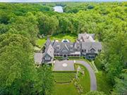 Located in the gated community of Conyers Farm, a private, lakefront country estate, ideally perched on over 10 acres. This extraordinarily chic shingle and stone residence was originally built in 2002 with enhancements and an expansion in 2017. Included in the extensive interior and exterior improvements, is a 6, 500+ sf addition offering a remarkable, one of one, full size regulation tennis arena which doubles as an NBA size basketball court, an oversized pool with hot tub, outdoor kitchen, outdoor fireplaces, a golf simulator and a golf green. At every turn, painstaking attention to detail abounds with lofty beamed ceilings and a stone fireplace in the family room, a large formal dining room, private office, renovated main house kitchen with a service pantry and wine cellar complete the first level. A luxurious and calming owner&rsquo;s suite with walk in dressing room, four additional ensuite bedrooms plus a separate 1-bedroom cottage provide ample living quarters. The third floor adds an indoor sport court, bar area, gym, bunk room and bath. With a Greenwich PO and access to the polo fields, 9 Cowdray Park also offers a dock on the idyllic 100+ acre Converse Lake. Tennis, golf, basketball and boating  recreation at your fingertips.