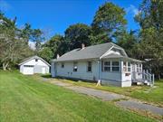 Oh so cute! This lovingly maintained home features updated kitchen with stainless steel appliances, updated bath, living room, dining room and 2 bedrooms. The home also offers wood floors, pantry, heated enclosed porch, screened porch, full basement with washer/dryer, large detached 1+ car garage, storage shed & more! Walk to stores, bank, post office etc! Close to area lakes, the Delaware river, Barryville farmers market, Bethel Woods and more! Additional Information: Amenities:Storage, HeatingFuel:Oil Above Ground, ParkingFeatures:1 Car Detached,