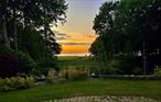 Surrounded by preserved land this classic home has an absolutely magnificent setting that includes stunning water views. The open kitchen, breakfast room and family room creates a comfortable bright living area that walks out to a lovely patio overlooking Gardiners Bay . The more formal dining and living room with fireplace also provides amazing views of the water.  The spacious primary bedroom with balcony is as dreamy as the view, which is truly incredible. An oversized bath and additional upper-level bedroom complete this private owner&rsquo;s area. Two main level bedrooms serviced by a full bath will accommodate family and friends beautifully. A two-car garage and studio with a half bath is a great place to set up your game room or home office. A full basement with high ceilings can be finished to incorporate an exercise or workout room. Lush landscaping with charming stone walls on 1.90 acres completes this peaceful location. Finished Square Footage 3420 includes the Studio. Property could accommodate a pool.