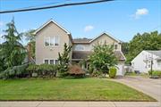 This stunning two-story home is on an 85 X 110 sq ft lot in the family-friendly neighborhood of Woodmere. From the open-concept kitchen and living space to the large backyard, there is plenty of room to enjoy. With 6 bedrooms, you have the flexibility to use this space as bedrooms, a home office, a children&rsquo;s playroom, a guest room - anything to accommodate your needs. Each bedroom has a large built in closet, with the master bedroom boasting two full walk-in closets. You will find tasteful updates throughout this luxurious home, including the 3.5 bathrooms conveniently located throughout the house. The 2 kitchens, 2 living rooms, and dining area make the perfect setting for either entertaining or some quiet relaxation time. Large windows in every room allow for an abundance of natural light, giving the home an airy and warm feel. The home offers a stand-in attic with flooring, a garage, and a large separate shed for even more storage space. Following the lush landscaping to the spacious backyard where you will be met with your perfect vacation area containing a large patio, a full-sized deck, and a semi-in ground vinyl pool. Central AC with 2 zones, natural gas, a prime location near shops, restaurants, train, and parks - Don&rsquo;t miss the chance to make this yours!, Additional information: Appearance:Excellent, Interior Features:Guest Quarters, Lr/Dr, Separate Hotwater Heater:Yes