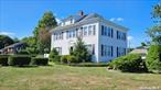 This Classic Colonial built in 1910 might need updating but has so many wonderful features. 2 fireplaces, 7 bedrooms, formal dining room and formal living room. Spacious kitchen and 4 bedrooms on the 2nd floor and 3 on the 3rd. The main bedroom has a sitting room. Home is in South Amityville.  It does not need flood ins.