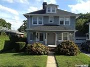 Old World Charm Abounds In This Lovely And Spacious Colonial, Featuring Hardwood Floors And Beautiful Traditional Touches Throughout. Updated Kitchen Cabinets With Granite Countertops And New Flooring, Huge Yard, 2 Car Garage, And An Inviting Porch Perfect For Relaxation Complete This Gem.