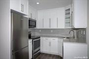 White shaker kitchen cabinets, quartz counters, stainless steel appl, DW, micro. Full size washer and dryer. Customizable closets, vinyl plank floors, high-hats, ceiling fans, crown molding AC. Subway tile bath, handheld rain showerhead, frameless shower doors. Sayville Village and Main Street nearby.