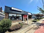 Two Story Masonry Building, Four Rental Units, Three Commercial Store Rentals and One Second Floor Apartment, Ample On-Site 21 Car Parking Spaces, 100ft Frontage on Lake Avenue, Across from St. James Elementary School, Four Separate Electric Meters, Gas, Oil Electric and Heat Pump Heating.