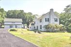 This stunning 5-bedroom, 3.5-bath Colonial, set on 1.9 picturesque acres, offers the perfect blend of timeless country charm and modern living. With hardwood floors throughout, spacious rooms, and plenty of natural light, the home is both elegant and inviting. In addition to the main house, the property includes a fully renovated, two-story carriage house with 2, 274 sq. ft. of flexible space, ideal for a guest suite, home office, or creative studio. An additional 800 sq. ft. storage shed in the backyard provides ample storage for tools or equipment. Located in a serene setting, this property offers privacy and outdoor space while still being close to local amenities-truly a unique find!, Additional information: Appearance:Great, Interior Features:Guest Quarters