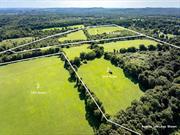 Your story begins here... Lot 2- 66.5 acres of vast fields- Welcome to Salem View Farms, a 400-acre haven of high, open fields, vintage stone walls, and stunning vistas. This former working farm offers an unparalleled opportunity to craft dream equestrian estates with 5 parcels comprised of 38-66+ acres of cleared, established farmland.  Located on the North Salem/Southeast border, Salem View Farms is part of a like-minded equestrian community that boasts more than 56 horse farms which include five Olympian show jumping riders that call this area home. The layout of the farms are a testament to the vision of renowned Olympic show jumping riders Kent Farrington and Daniel Bluman who both own horse properties in this area. Highly successful trainers and owners also operate some of the most elaborate equestrian properties in this horse-friendly locale. State-of-the-art veterinary clinics and farriers ensure top care for your horses. Recently permitted to include your custom home, stables, riding rings, and paddocks, the parcels are nestled in a community that cherishes the equestrian lifestyle. Salem View Farms holds a strategic location with close proximity to many FEI rated horse show venues and CSI 2*- 5* events held at Old Salem Farm, HITS Saugerties, Silo Ridge Masters, the Greenwich Polo Club in Conyer&rsquo;s Farm and the Hampton Classic. The property also has access to an extensive trail system and is home to the Golden&rsquo;s Bridge Hunt. The community brims with a diverse choice of restaurants, entertainment venues, and shopping options. A little over an hour from NYC, access to major airports facilitates travel for European competitions.  Salem View Farms presents a unique opportunity to create your own equestrian paradise, the ideal complement to the seasonal competitions in Florida. We have a team of local architects, builders, stable and ring builders ready to bring your vision to life.