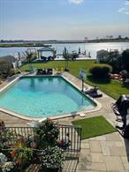Magnificent Open Bay Waterfront Custom Built Home. 10 ft. ceilings on main level. Radiant heat floors, Open concept LR, DR, huge Kitchen with oversized island, coffee bar, wine cooler and high-end appliances. 5 BDR, 3 full baths, 3 large decks, huge yard with heated in-ground pool & gazebo over looking bay, in-ground sprinklers, Dock & boat lift. House lifted in 2018 & features Elevator & FEMA compliant. House features fire suppression sprinklers. Great for entertaining!, Additional information: Appearance:Mint, Green Features:Insulated Doors, Separate Hotwater Heater:N