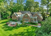 Fall in love with this classic brick residence from the moment you arrive. Built in 1939, this exceptional home has been thoughtfully reimagined and rebuilt by Cecilia Wheeler, offering the finest materials and attention to detail. Expanded to approximately 6, 800 square feet of comfortable, yet refined living space, each room is worthy of a grand celebration or a quiet evening relaxing. Upon entering, you will appreciate the intricate millwork and moldings, spacious formal living and dining rooms, paneled study and spectacular sun room, The home&rsquo;s centerpiece is its expansive gourmet kitchen designed by Bilotta in NYC, featuring Rutt Cabinetry, 2-inch Calcutta marble island and the finest appliances. Adjoining the kitchen is a sunny breakfast room and spacious family room with fireplace and custom bookcases, the perfect retreat for watching the big game or cozying up with your favorite book. A spacious mudroom, exquisite powder room and 3 car garage complete the first floor. All bathrooms feature marble tile, Waterworks fixtures and custom vanities. The finished lower level provides approximately 3, 000 square feet of functional space and oversized egress windows with home gym, family room, recreation room, custom laundry room, full bathroom and abundant storage. With 1 acre of flat, park-like private property, professionally landscaped by Ireland Gannon, you will enjoy outdoor gatherings and recreation with family and friends. A true Manhasset lifestyle, with an ideal location with easy access to shops, train and schools. Munsey Park Elementary.