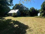 Attention Investors, 3 bedroom 2 bath cape on 1.23 acres. 43x28 (1204 square-foot) Barn with 18 Ft Ceilings. Full Basement. Cash only. Sold AS IS.