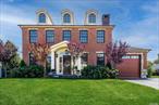 Stop your search! This stunning center hall brick colonial is the embodiment of luxury and sophistication. With soaring 10-foot ceilings and masterful craftsmanship, every detail of this home is designed to impress. Step into a culinary paradise crafted by award-winning designer Ken Kelly. This breathtaking open kitchen features imported Italian Carrara marble throughout, including an expansive 54 x 121 island, two sinks, dual full-size dishwashers, and an oversized chef&rsquo;s double refrigerator-everything you need for effortless entertaining. The spacious living room invites gatherings with its custom hardwood floors, generous sitting area, and cozy wood burning fireplace. Oversized custom moldings and high-end large Andersen windows enhance the home&rsquo;s brightness and warmth, creating an inviting atmosphere. Five exquisite steel French doors lead to a stunning covered cobblestone patio, where you&rsquo;ll find a luxurious 18 x 36 in-ground pool, a relaxing hot tub, and a pool house-perfect for summer gatherings. The large formal dining room adjacent to the kitchen sets the stage for unforgettable dinners. Retreat to the large primary suite, complete with a double gas fireplace for cozy winter evenings. The lavish marble bathroom features an oval jetted Jacuzzi tub, a spacious two-person shower with custom jets, and a double vanity. Enjoy your morning coffee on the private balcony, overlooking the serene and beautifully landscaped backyard. The second floor boasts two additional spacious bedrooms, a modern full bath, and a laundry room equipped with Electrolux appliances for your convenience. The high-ceilinged extra-large basement, featuring a private entrance, offers endless possibilities. Set in a desirable mid-block location, this home features exquisite specimen plantings and a fenced yard, providing you with the privacy and tranquility you deserve. This is not just a house; it&rsquo;s a lifestyle waiting for you to embrace. Don&rsquo;t miss your chance to make this dream home your own!, Additional information: Appearance:Diamond, Interior Features:Marble Bath, Separate Hotwater Heater:Y