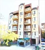 Elevator building. 2Br, 1bath, Formal Dining Room, Lr, Balcony, Hard wood floor. Near park, school and post office.