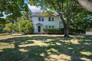 Charming Farmhouse with Modern Updates and Prime Location. Perched on a hill at the corner of Route 48 and Marys Road, this charming 1, 350 sq ft farmhouse blends timeless character with thoughtful modern updates. Renovated in the early 2000s, the home boasts new electric, two-zone heating, a home security system, and an upgraded septic system, providing both comfort and convenience. The versatile home/office layout offers plenty of space and charm. Step through the tree-covered front entryway into a generous living room or through the back entrance into the foyer/mudroom. The ground floor includes two inviting bedrooms/private offices, one of which has a working brick fireplace. An enclosed porch, powder room, and a full unfinished basement provides extra storage and endless future possibilities. Upstairs, the second-floor retreat shines with a vaulted cathedral ceiling and ambient cove lighting, creating a warm and inviting atmosphere. With its large open living space, a kitchenette, a bedroom, and a full bath, this is a perfect space for guests or additional living quarters. Outside, the back deck is the ideal spot to unwind, dine alfresco, and watch the sunset. Nestled in a prime location, you can easily walk to Mattituck High School, the charming shops and eateries on Love Lane, the local library, as well as the LIRR and Hampton Jitney for seamless travel. With its mix of privacy, modern features, and proximity to everything Mattituck has to offer, this farmhouse is a true gem for those seeking charm and convenience. Zoned RO - Residential Office.