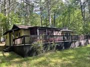 The Lazy Daze Truly a rare perfect Upstate partial water views cabin on York Lake ( about 50 yards away from the lake in a very private mountain top). The Delaware is a Nationalscenic and recreational river( about 1/2 at the Botton of the mountain), spectacular in its pristine beauty and perfect for white water rafting. This 1940 cabin is ready for your getaway entertaining needs. Perfect for long walks , boating, fishing, kayaking , swimming on a pristine cristal clear spring lake and its mineral waters to sitting on the large deck or on the large screened porch enjoying your favor beverage. features of this cabin will show as you arrive in this gated community(without the HOA fees). the opened floor plans features cathedral ceilings, a beautiful large stone fire place and stunning wide plank flooring. 2 bedrooms, full bath, laundry room, makes this a perfect retreat. In addition you are able to generate extra income from the tremendous rental opportunity on Airbnb AND MUCH MORE..