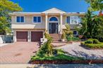 Introducing This Oceanside Waterfront 4 Bedroom 3 Bath Wide-line Stucco Contemporary Hi Ranch. Features Include a Second level Formal Living Room with Built In Cabinetry. A Dining Room and New Chefs Eat In Kitchen with a Cathedral Ceiling and Skylights, Center Island, White Shaker Cabinets, Stainless Steel Appliances, Quartz Counter Tops and Sliders To an Upper Deck. The Master Bedroom Boasts a Private Bath, Walk In Closet & Sliders To a Screened Porch and the Upper Deck. Lower Level Features a large Bedroom, a Full Bathroom 2 Car Garage and a Den with Sliders To a Your Private Yard & In Ground Heated Pool & Private Dock. Solar Panels are Owned & Paid In Full. 150 Amp Electric, Transfer Switch & 2 Car Paver Driveway On Quiet Dead End Street., Additional information: Appearance:Mint, Separate Hotwater Heater:Yes