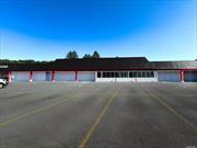 Former Great American Supermarket (Out of Business) Recently renovated exterior. NNN lease available. Prime location in the town center, suitable for large-scale use. The strip center offers ample parking and currently includes tenants such as Dollar Tree, Family Dollar, Rent-A-Center, and Hahn Auto. No other supermarkets within walking distance or the town center.