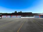 Former Great American Supermarket (Out of Business) Recently renovated exterior. NNN lease available. Prime location in the town center, suitable for large-scale use. The strip center offers ample parking and currently includes tenants such as Dollar Tree, Family Dollar, Rent-A-Center, and Hahn Auto. No other supermarkets within walking distance or the town center.