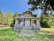 Full of charm and character this little gem awaits your vision to be brought back to its well- deserved glory. Located on River Rd, across from over thousands of protected aces owned by Bard stands this 1875 colonial farmhouse. a charming front porch open into a sweet entry alcove and then into a handsome 35 ft wide living space with antique floor to ceiling windows, opposing bay windows and wood floors. Filled with light and good cheer this room is perfect for entertaining. Walk through to the library (or formal dining room) with charming built-ins and then on to the spacious eat-in kitchen with wood cabinets and granite counters. One antique bathroom completes the first floor living space. Upstairs are 3 cozy bedrooms and a small attic storage area. Oversized back yard with privacy and a barn offer lots of options. Come see for yourself. A unique offering awaits.