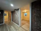 Office space/storage unit with 2 rooms, exposed brick, bathroom and private entrance, available.