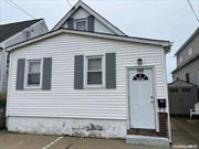 This affordable legal 2 family waterfront is perfect for that savvy buyer who wants the enjoyment of a super wide, deep, canal and water views headed seconds out to the bay, hitting all the beaches, and Fire Island. Low taxes Great beach living in Lindy Village-close to schools, parkways and shopping and wonderful downtown Lindenhurst including the LIRR. Interior renovations approximately 11 years young. bulkhead, plenty of storage and much, much more., Additional information: Separate Hotwater Heater:yes