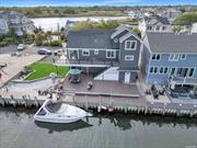 Welcome to your new sanctuary on the Great South Bay in Lindenhurst-a stunning boater&rsquo;s paradise. You will enjoy breathtaking panoramic views and luxurious living harmoniously blended across three levels of elegant space. Experience unobstructed sweeping views of the Great South Bay from every angle of this exquisite home. With 80 feet of Navy wall bulkhead, this home is a boaters paradise. You will enjoy a front-row seat to stunning sunrises and serene sunsets every day. This expansive home features three thoughtfully designed levels, each offering unique spaces for relaxation and entertainment. The main level is designed to capture and enhance the natural beauty of its surroundings. Large windows flood the space with light, creating a bright and airy atmosphere perfect for both everyday living and entertaining. Both the main and lower level have radiant heating in the floors. The large primary suite boasts a huge ensuite with double vanity, extra wide 4ft shower with dual shower heads, body sprayers and jetted Jacuzzi Tub featuring water views. As you enter the kitchen you are greeted with granite counter tops and Stainless steel appliances, ample counter space, and custom cabinetry. Whether you&rsquo;re preparing a casual meal or hosting a dinner party, this kitchen has everything you need. The living area seamlessly connects to the wraparound waterfront deck with brand new Trex Deck. It is perfect for enjoying morning coffee, evening cocktails, or simply soaking in the tranquil surroundings. The expansive outdoor space is ideal for summer gatherings or peaceful solitude. The upper level boasts a family room, storage room and two bonus rooms that can become bedrooms with proper permits. The lower level is perfect for hosting guests or creating your own entertainment zone. With plenty of space for a game room, media area, or additional guest quarters, this level adds flexibility and functionality to your living experience. The summer kitchen provides ease and convenience while prepping for BBQ&rsquo;s and is perfect for entertaining guests. All three bathrooms are beautifully designed, featuring contemporary fixtures, stylish tile work, and ample space for pampering. There are 2 paved driveways and plenty of street parking for guests. Situated in the charming community of Lindenhurst, you&rsquo;ll benefit from a serene environment while being conveniently close to local amenities, schools, and transportation options. This remarkable home offers an unparalleled living experience on the Great South Bay, combining luxurious interiors with stunning natural beauty and versatile living spaces. Don&rsquo;t miss the opportunity to make this waterfront dream home yours. Schedule a showing today and envision the life you could lead in this extraordinary setting!, Additional information: Appearance:Diamond, Interior Features:Guest Quarters, Marble Bath