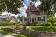 A rare find in Crestwood with 3, 300 square feet and a .23 acre level lot, this five bedroom Victorian has room for everyone. 215 Read Avenue is only a five minute walk to the Metro North station at Crestwood. There is an enclosed wrap around front porch with huge windows and a beadboard vaulted ceiling. The entry is spacious with an impressive staircase banister that looks over a large living room with a fireplace. The dining room is also large with a charming window seat. The ceiling height on the first floor is an impressive 9.5 feet and the windows are all oversized. The kitchen has an island and an eat in area with a powder room tucked away. The second floor has four bedrooms and a bath. The third floor is a private master suite with a walk in closet and an en-suite bath. The lower level is finished with a full bath, large finished room, laundry and utilities.