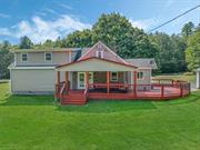 Welcome home to this spacious 4 bedroom, 2 bath house that sits beautifully on 4 acres. Built in 1940, it&rsquo;s been recently updated with thoughtful additions. The main floor features a walk-through kitchen with butcher block countertops, stainless steel appliances, and dining area. The cozy living room has abundant natural light & a woodburning stove that will keep you cozy during the colder months. Each floor has two nicely sized bedrooms & a full bath.  Beautiful hardwood floors throughout.  You&rsquo;ll love entertaining on the covered back deck that opens onto the expansive, level, and private backyard that&rsquo;s bordered on three sides by mature trees.  With just over 4 acres, there&rsquo;s plenty of room for gardening, building a swimming pool, or whatever you can imagine!  A detached two car garage & full basement offer plenty of space for storage. Close to Fallsburg & Monticello for shopping & restaurants. Less than 2 hours to GWB. Country living at its finest!