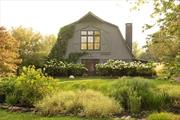 This c1920 dairy barn has been transformed into an incredible private residence with soaring ceilings and light filled spaces. Set on a bucolic country road just 90m north of NYC, the barn sits on a 6+ acre lot with no neighbors in sight. The landscape is made up of rolling hillside, open fields and deep forest. Stepping inside you&rsquo;re greeted by a wide, open staircase leading you up to the second floor. The original hay loft has been converted to a giant Great Room with incredible ceiling height, skylights and exposed beams. French doors at the far end open to a beautiful view of wildflower meadows and a woodstove sits in the corner. An amazing space to gather, celebrate, or enjoy the peace and quiet that this property offers. On the first floor you&rsquo;ll find an open kitchen with Plain English designed cabinetry and beautiful antique cupboards. Soapstone countertops have been paired with unlaquered brass hardware. A woodburning fireplace sits in the corner and the open concept creates another wonderful space to congregate and relax, all anchored by a large central island. In this original section of the barn there are four bedrooms, one ensuite, and one additional full bath. A new wing was added onto the barn in 2022. From the kitchen, one enters a beautiful sunroom, there is a half bath tucked off to the side and a wall of glass leads one down the hallway into what the current owner&rsquo;s use as a master suite. It is large and light filled with a walk-in closet and full bath tiled in green zelliege. Two sets of french doors lead outside where you&rsquo;ll find an outdoor shower and a fenced in vegetable garden. Old rustic barns serve as charming lawn ornaments and screen the property creating total seclusion. Around the corner you&rsquo;ll find Inness, an amazing hotel & restaurant with a spa opening this year. You&rsquo;re just 10m to Stone Ridge and 20m to Kingston. A private oasis just 1.5h to NYC.