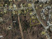 Recent Board of Health approved for a 3 Bedroom home. Lovely wooded lot on 1.89 acre with town water hookup. 202&rsquo; road frontage. Site will need 2.0 feet of fill. There is an available approved site map. There is an easement for the DCWWA on the property. Great location, minutes to village. Come and discover historic Hyde Park, Home of FDR, Vanderbilt Mansion, Norrie State Park. Enjoy the rail trails and Hudson River Walkway. 12 minutes to Pok MNRR station. Easy driving to Marist College, DCC, minutes to CIA, 2 local hospitals in area. State Park, Dinsmore Golf Course and boating on the Hudson River! Lawn has been mowed so that you can park and walk the lot. Enter where there is a big tree log across the driveway. Please register your appt on ShowingTime for additional instructions. Contact L/Agent for DC Health Dept approval letter, Engineering report, Site Plan and Survey.