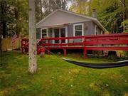 If there is anything better than waking up and drinking a cup of coffee in your Adirondack chair on your private dock overlooking a still, quiet mountain lake we just haven&rsquo;t found it yet. This three bedroom, one bath lakefront cottage is as charming as it is practical. The flat, level lakefront makes it feel that the lake is simply an extension of your back yard. The interior is just what you would think of in an upstate lake front cabin. Simple, efficient and inviting. It feels as if you&rsquo;re leaving it all behind for a simpler, better time where you can enjoy that coffee on the dock, take a kayak and go fishing at your leisure, play card games at the dining table and end the night around a campfire with your friends and family. Lake Muskoday is a private, non motorboat lake with an excellent sense of community. Don&rsquo;t miss your opportunity to own a piece of real estate that is not only an investment, it creates fond memories that last lifetimes. Life begins where the land meets the water.