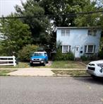 Great opportunity for investors! Oversized corner lot in Bellmore. House needs work. Let this be your next project!