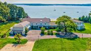 Welcome To This Extraordinary Custom Waterfront Home On Eatons Neck, Facing Northport Harbor. Boasting 200 Feet Of Prime Beachfront Property On 3.5 Acres With A Gorgeous Landscaped Backyard. Whether Boating, Paddle-Boarding Or Simply Spending Time On The Sandy Beach, This Home Has It All! The Racquetball Court, Indoor Pool And Solar Farm Are Just A Few Amenities Of This Gorgeous House. The Back Patio And Upstairs Balcony Are The Length Of The Home Giving Gorgeous Views Of Sunrises Sunsets. Perfect For Entertaining, Cozy Up By The Outdoor Fireplace Or Take A Dip In The Indoor Pool. The Spacious Interior And New Custom Kitchen Lend Itself To Enjoying Cooking A Gourmet Meal While Your Guests Lounge In The Luxury This Home Presents. The Primary Suite Is Unique With Cathedral Ceilings, Full Views Of The Harbor And Boasting Two Grandiose Walk-In Closets. Upstairs Entertainment Area Is Impressive On Its Own With A Large Living Room, Spacious Bedroom With Access To An Upstairs Deck From Both The Primary Bedroom And Kitchen. Other Upstairs Bedrooms Grant Access To A Large Balcony With Beautiful Views Of The Harbor As Well. It&rsquo;s Like Being On Vacation Year Round!