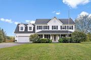 Sitting on 2+ acres and bordering corn fields, this 4 bedroom, 2.5 bath colonial offers the perfect balance of country life and modern convenience, located only minutes from town. WALLKILL SCHOOLS, with over 2, 300 square feet of comfortable living space. This home features beautiful hardwood floors, central air, and a freshly painted interior. On the main floor, you will love the amount of natural light that floods the living room, formal dining room, and the spacious kitchen. A half bathroom and sitting room complete the lower level. Upstairs, you will LOVE not carrying laundry up and down the stairs, as the laundry room is located on the same floor as all 4 bedrooms. Including the primary suite, complete with oversized bathtub AND a shower! Enjoy summer days in the swimming pool, or evenings on the deck while taking in the serene farmland views. 2 car garage for the cars or toys, with full unfinished basement and attic for additional storage capabilities. Additional Information: ParkingFeatures:2 Car Attached,