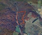 42-plus acres in the heart of Ancram, New York. Farmland rich in history. With varying topography changes, this wooded parcel offers multiple home site possibilities that will afford buyers options in how they choose to live. Begin your journey by turning down the iconic dead-end dirt road. Savor the calm of a picturesque rural setting as you arrive at the entrance of your future home. Walk the beautiful trail that the seller has created. Experience all this location offers, including nearby hiking, skiing, and equestrian activities. Shop local farm stands and dine at various distinctive restaurants in the surrounding villages of Hudson, Chatham, and Rhinebeck. Visit neighboring Massachusetts and Connecticut.