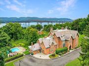 Offering a unique opportunity to own a piece of architectural history, The Rest, a High Victorian Gothic-style home that sits majestically on the western banks of the Hudson River in the Balmville hamlet of Newburgh. Built for Daniel Bennett St. John, one of the founders of The New York Times, this home was crafted by the renowned architect Frederick Clarke Withers, a leader of the American Gothic Revival movement in America and protege of Andrew Jackson Downing. Exceptional craftsmanship, amazing river views, and meticulous attention to detail throughout define this gorgeous three-level home featuring intricately carved wood moldings, soaring 11+ foot ceilings, floor to ceiling windows, and rich hardwood surfaces. It is currently being used as a five-bedroom home but could easily live as an eight-bedroom, and offers large spacious rooms, an open and seamless layout and 4.5 bathrooms. One of the most breathtaking features is the Tiffany-style stained glass window, a true masterpiece that transforms with the changing light throughout the day, casting vibrant displays of color and creating a living work of art. There were six original fireplaces, five of which had been converted to coal, but the beautiful custom carved marble mantles remain intact. The library&rsquo;s wood-burning fireplace is still functioning and features a finely carved wood mantel. There is also a skylight spanning from a cupola above to the third and second floor, providing light into both levels. The house provides ample space for extended family, an au pair, or dedicated quest quarters. The exterior is adorned with elaborate Gothic details that mirror the home&rsquo;s stunning interior. As an apprentice of Andrew Jackson Downing, and a partner of Calvert Vaux, it is apparent that Withers applied their philosophies of integrating architecture and nature when determining the position of this home, strategically complementing the picturesque Hudson River landscape and view. A stunning bluestone veranda stretches along the river-facing side of the house, offering breathtaking views and serving as an extension of the indoor living space. Other quality features include an updated chef&rsquo;s kitchen with a stunning reclaimed wide-plank wood flooring that extends into the family room, a convenient butlers pantry, updated bathrooms, screened in porch overlooking the pool area, 18&rsquo;x36&rsquo; in ground concrete pool with brand new pump, beautiful landscaping, and blacktop circular driveway. Ideally located just 64 miles from Manhattan and only 6 miles from the Beacon Metro North Train Station. Also, minutes to local restaurants, shops, hiking, walking trails, the Powelton Country Club, and major highways. See floor plan and 3D walk-through tour.