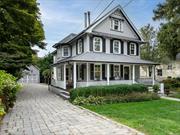 Step into this spectacular Victorian Farmhouse with a wrap-around front porch, clapboard siding and working wood shutters in Huntington Historic District. Completely renovated and added onto by its architect owner in 2009, this home exudes historic charm while offering all of today&rsquo;s luxury amenities. Upon entering you are greeted with the warmth of cherry wood floors and an eye catching staircase with its original carved banister and finial. There is an office with pocket doors on the left which could also be a 5th bedroom. Moving through the first floor you&rsquo;ll enter the luxurious living room/dining room area with custom cherry millwork and a wood-burning stove. The all white marble, eat-in chef&rsquo;s kitchen is state of the art featuring a large center island, 2 sinks, 2 dishwashers, a pot filler, 6 burner gas range, Viking double oven, a warming drawer, marble counters and a tin ceiling. Upstairs there are 4 spacious, bright and airy bedrooms and 2 full bathrooms. The primary suite has its own full bath and dressing area. The laundry is conveniently located on the 2nd floor. There is an extra large bonus/entertainment room on the 3rd floor with a counter, sink, microwave and fridge for drinks and snacks. The backyard is a private oasis highlighted by a glistening inground heated saltwater pool (2009). The paver driveway leads to a barn/garage with a large loft.