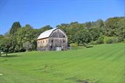 Calling all artists! This renovated barn near Callicoon offers plenty of creative space in which to paint, sculpt, woodwork, metalwork -- whatever craft sparks your passion. The 48&rsquo; x 35&rsquo; upstairs loft is massive, with high ceilings, open spans, and lots of natural light from a glass garage door that allows large works to be moved in and out. There&rsquo;s even a loft above the loft, for storage or office space, plus a full bath. The first floor features 1, 712 square feet of finished living space, with a bedroom, open kitchen/dining/living room, a tiled full bath, two bonus rooms and a mechanical/utility room. Nice touches include wood floors, whitewashed open-beam ceiling, kitchen island, and sliders to the lawn. Fully insulated with Monitor heaters. Upstairs loft walls are also insulated. This property is located in Long Eddy, 15 minutes from both Callicoon and Hancock, with easy access to the Delaware River. 2 hours NYC.