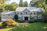 The perfect family home. Perched atop a manicured knoll, on a quiet cul de sac, sits this stunning colonial in the coveted neighborhood of Flower Hill Manhasset. Completely renovated in 2004, this home boasts over 6500 sq ft of living space which includes, 5 en-suite bedrooms, a large family room with 10 ft ceilings, 2-sided gas fireplace, custom paneling and built -ins, a large eat-in kitchen featuring Sub-Zero and Wolf appliances, marble countertops, and 10 ft island. Formal dining room, living room with wood burning fireplace, custom mahogany paneled tv room with coffered ceiling, office gym and mudroom. Custom details throughout.