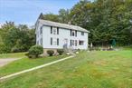 1900&rsquo;s farmhouse with picturesque mountain views and a pond. This home has a lot of potential. Large living/kitchen area and additional sunroom and office/workout room that could be renovated for any number of purposes. 3 bedrooms and 2.5 baths make this home spacious and inviting property with room to garden, play and relax all with beautiful mountain and field views. Plenty of room for storage and a 2-car garage.