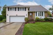 This extraordinarily spacious and updated split-level home can suit the many needs of today&rsquo;s lifestyle. Flooded with light from the great expanse of Pella windows on the main level, which has a large entry foyer, graciously sized formal living and dining rooms and eat-in kitchen. The kitchen features eat-in area with bay window, lots of wood cabinetry, granite counters and backsplash, stainless steel appliances including refrigerator, built-in microwave, trash compactor, dishwasher, gas cooktop and convection oven. A few steps down to the main den, which has been expanded to include a sunroom with walls of glass and sliders to patio. The den also features a wet bar with sink & wine fridge, tile flooring, ceiling fan, half-bath and gas fireplace. The lower basement level is finished and includes tile flooring, large laundry room, full bath, library and great room for an extensive and private home office or craft space with lots of closets. The primary suite easily accommodates a king-sized bed and has custom built-ins and desk as well as a full bath with shower and large closet with shelving. The walk-up attic is also finished space or just use for storage galore! Additional features include gleaming hardwood floors, hi-hat lighting, crown molding, Pella windows, ceiling fans, central air conditioning, 200 AMP upgraded electrical service, 3 full tile baths and one half bath, three bedrooms,  attached two car garage with interior access, ductless heat and AC units, 3-zone gas heat, 4-zone CAC, whole house generator with direct gas line hook-up, fire and burglar alarm a full generator . The exterior has double-wide driveway, brick garden wall, brick walk and bluestone stoop, 6-zone inground sprinkler system, patio, shed, beautiful landscaping including flowering trees and shrubs! Tucked away in a lovely neighborhood location this home is close to everything central Nassau has to offer including great shopping and dining, quick access to major parkways, close to LIRR stations, parks and recreation and less than an hour to Long Island&rsquo;s famous South Shore beaches.