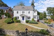 Curb appeal! On a tree-lined street with iron gas lamps, step into the timeless elegance of this 1930 center-hall colonial, a mile from Vassar College, in one of the City of Poughkeepsie&rsquo;s most desirable neighborhoods. Perched on a hill, this 4 bedroom, 2.5 bathroom beauty has a classic slate roof, hardwood floors, made-to-order moldings and numerous double doors that permeate vintage charm. Enter through a stunning portico that sets the elegant tone and the spacious living room boasts a cozy fireplace perfect for gatherings or quiet evenings. The three-season enclosed room offers a tranquil space for relaxation or a home office. An additional formal den provides a private workspace. Upstairs, primary bedroom has dressing room. Outside, the manicured front yard enhances the home&rsquo;s stately appearance. Conveniently located near shops, restaurants and a five-minute drive to the PK Train Station, this home offers historic charm and modern convenience in a beautiful part of the city. Additional Information: ParkingFeatures:2 Car Attached, Appliances: Electric Water Heater ConstructionDescription: Wood Siding,  FoundationDetails: Slab,