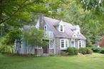 Well built cape with many upgrades in EXCELLENT condition on 1 full acre. Convenient location in Youngsville, NY, minutes from the Village of Jeffersonville and Callicoon for shopping and restaurants. Updated kitchen, formal dining room with bay window, cozy living room with walk-out to private covered porch, bedroom and full bath all on first floor for easy living. Two large upstairs bedrooms with unique nooks, a full bath and separate ancillary room. Beautiful vintage molding frames all windows and doors and hardwood flooring flanked by custom 6â€ baseboards throughout. All replacement windows excluding bay windows. Abundant closet and storage space. Full basement with new furnace (2020). Enjoy the large, private partially sloped, wooded rear yard for gardening, entertaining or relaxing with nature. Its all been done for you so just move in and enjoy! Additional Information: HeatingFuel:Oil Above Ground,
