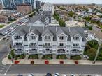 Welcome to Your Coastal Sanctuary: A Stunning Upper-Level Townhome. Step into a world where luxury meets tranquility in this pristine 1900 Square Foot upper-level unit, perfectly nestled just moments from the stunning shores of Monroe Beach. With vacation-year-round vibes, Long Beach invites you to experience the ultimate blend of relaxation and convenience, only 50 minutes from the hustle and bustle of NYC. As you enter, be captivated by the pristine open concept living area with gas fireplace that warms the spacious living area, bathed in natural light from not one, but three charming balconies-two East-facing, perfect for morning sunrises, and one West-facing, ideal for sipping sunsets. The expansive primary bedroom suite serves as your personal retreat with an airy vaulted ceiling and second gas fireplace, featuring a generous walk-in closet and a luxurious five-piece bath that transforms daily routines into indulgent experiences. Need a space for work or workouts? An additional office area is seamlessly integrated, catering to your lifestyle needs. Enjoy cooking in the eat-in kitchen, adorned with stainless steel appliances and gleaming hardwood floors that flow throughout the home. Recessed lighting adds a touch of sophistication, creating an inviting atmosphere for both quiet evenings and lively gatherings. Convenience is key with in-unit laundry, a designated garage spot, and an additional parking spot, ensuring that your coastal living experience is as effortless as it is enjoyable.This pet-friendly gem not only offers a beautiful space to call home but is also rentable, making it an exceptional investment opportunity. Park with ease in your garage spot plus an additional parking spot. Explore nearby shops, hop on the LIRR for one of 27 daily trips to NYC, or take a leisurely stroll along the famous 2-mile boardwalk. This townhome isn&rsquo;t just a place to live; it&rsquo;s a lifestyle waiting for you.