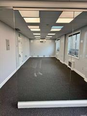 Second floor office suite located in the heart of downtown Garden City. Convenient to shops, restaurants and the LIRR.Newly (2024) renovated office, approximately 600 square feet including a soundproof 12x12 office. 2 shared hall powder rooms.