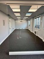 Second floor office suite located in the heart of downtown Garden City. Convenient to shops, restaurants and the LIRR.Newly (2024) renovated office, approximately 600 square feet including a soundproof 12x12 office. 2 shared hall powder rooms.