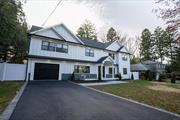 Welcome home! This 5 Bedroom 5 Bathroom Colonial exudes character from the moment you walk through the front door. 1st floor bedroom is perfect for guests with own separate full bathroom. Get cozy in the open concept living room featuring a fireplace. Brand new Trex deck is a great addition perfect for year-round enjoyment. This house features two master bedrooms, each with its own separate bathroom. The primary Master bedroom features a double walk-in closet and a Master bath with jacuzzi. Finishes on this house are the definition of elegance. All 2nd floor bathrooms feature heated floors. The vibrant brand-new espresso hardwood floors are both beautiful and durable. Location is IDEAL with a less than 5-minute drive from downtown Huntington. Plenty of fine dining and entertainment is a skip away. The charming Heckscher park in the heart of Huntington is a 2-minute drive away. This location affords you walking distance to the best Huntington has to offer. 4 of the 5 bedrooms have en suite bathrooms. Smart home living allows for convenient control with the push of a button. The Kitchen features an island, wine-cooler, double oven and all top-of-the-line appliances. James Hardie siding gives this home as beautiful an exterior as its interior is. Too much to mention in this description!